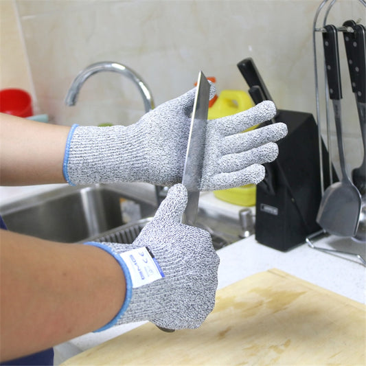 A men trying to cut on hand with knife with wearing cartozy cut resistance gloves